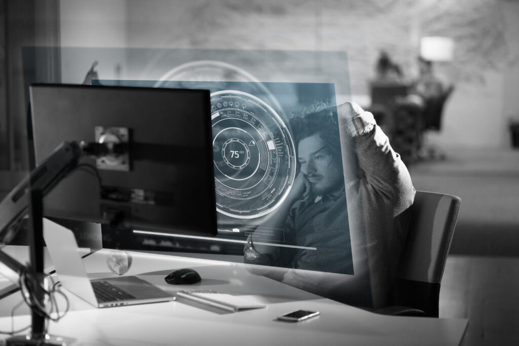 Bored employee waits for slow computer to load