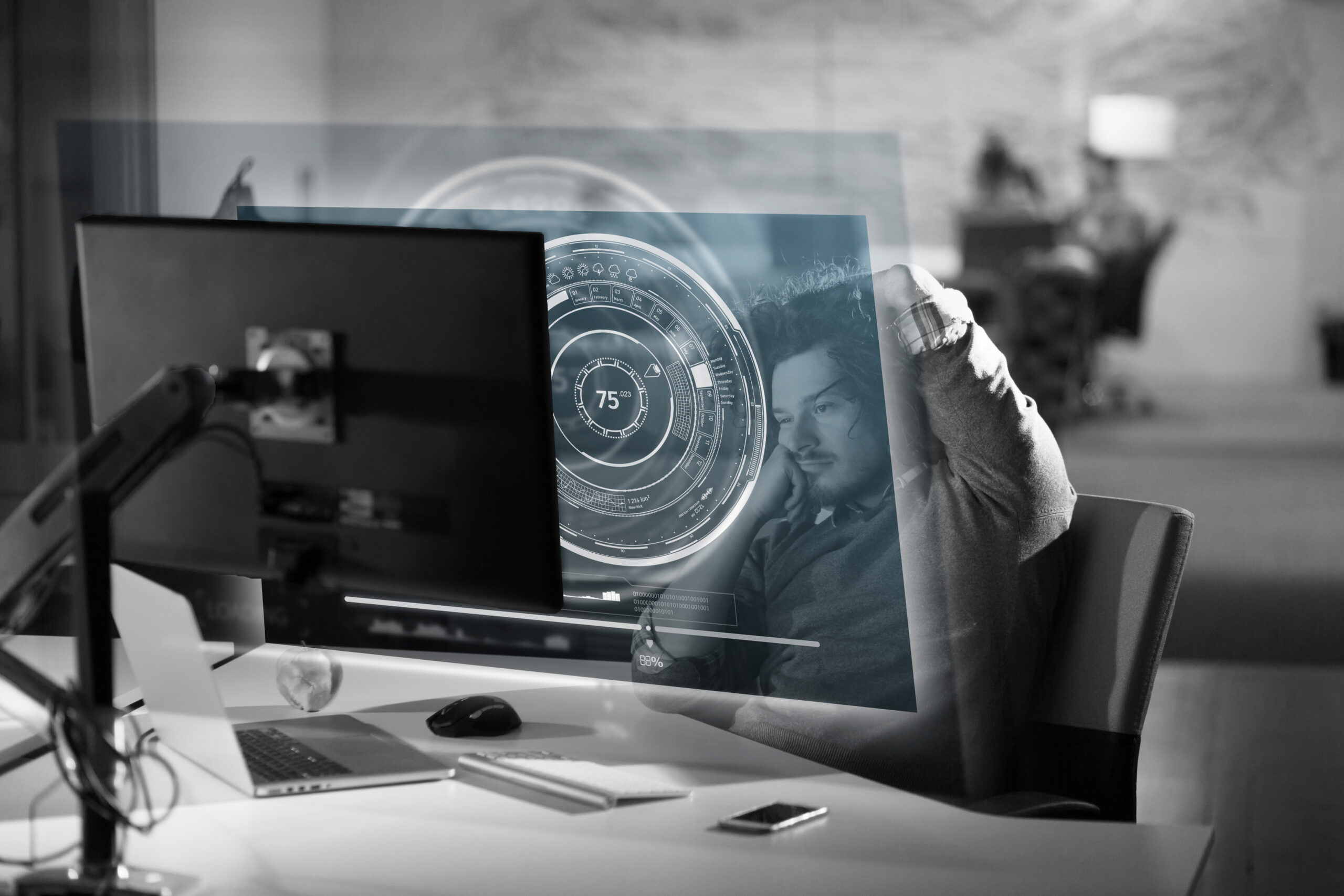 Bored employee waits for slow computer to load